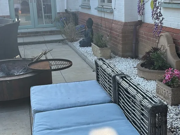 Outdoor living space with seating designed by Cwtch Design Oxford